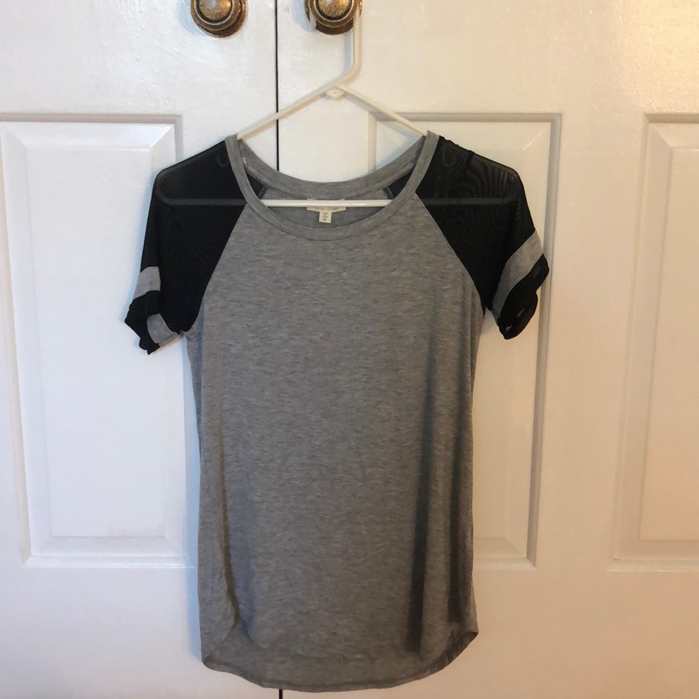 gray t-shirt with black mesh sleeves